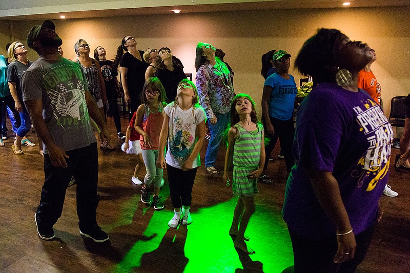  Zombies-in-training practice their steps in preparation for a "Thriller" flash mob that will be a highlight of Saturday's Fall Festival in downtown Texarkana.