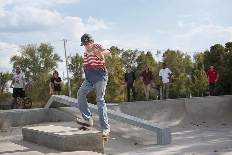 Cody Brown of Texarkana, Ark., does a frontside Smith grind on the box at the new skate park in downtown Texarkana, Texas. Brown said he grew up skating in Texarkana and is very happy with the new park.