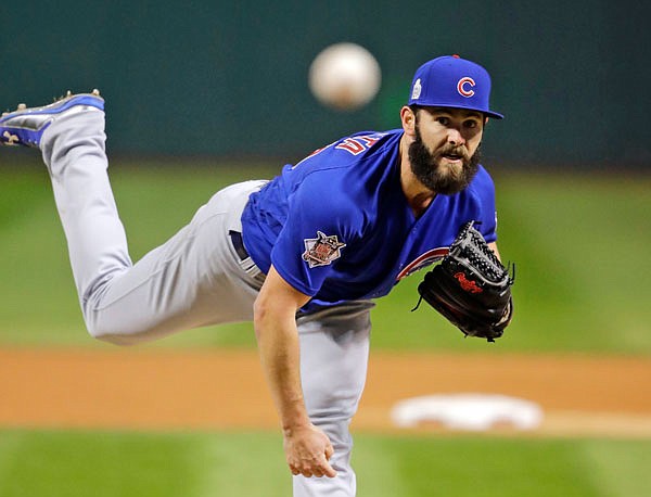 Cubs starting pitcher Jake Arrieta throws a pitch during the first inning of Wednedsay's Game 2 of the World Series against the Indians in Cleveland.