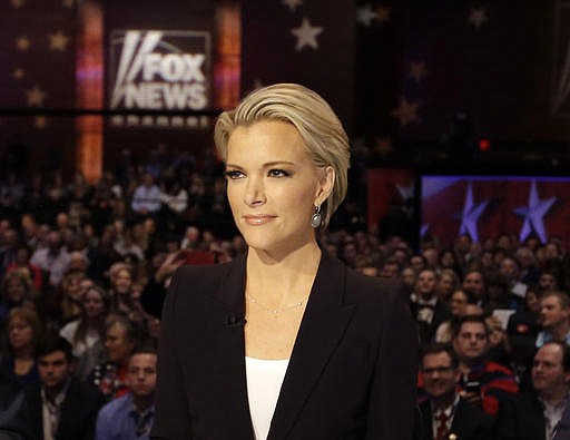 In this Jan. 28, 2016 file photo, Moderator Megyn Kelly waits for the start of the Republican presidential primary debate in Des Moines, Iowa. 