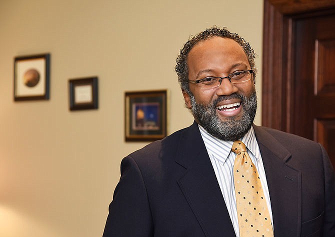 Rod Chapel poses in his Jefferson City law office. Chapel, the NAACP state president, spoke about the NAACP's voting positions at a meeting Thursday at Quinn Chapel A.M.E.