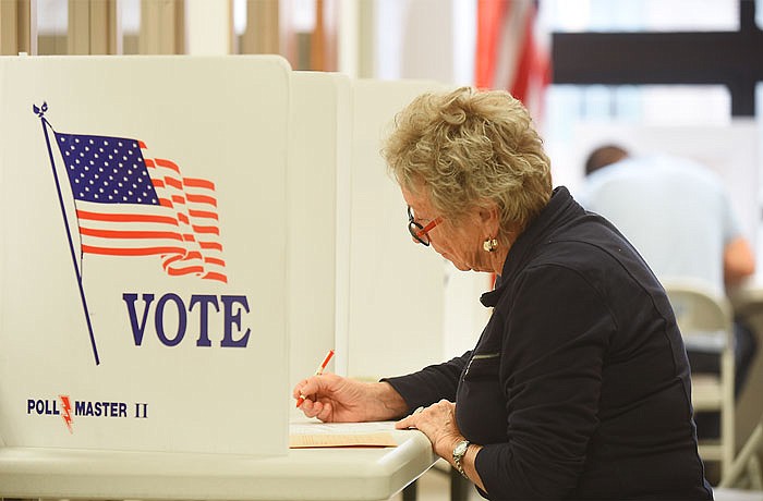 Luana Gifford fills out her ballot in early voting at the Cole County Clerk's office Monday, Oct. 31, 2016. Absentee voting began Sept. 27 and runs through Nov. 7 for the Nov. 8 election. After the election, she will be part of a group that will work to verify ballots.