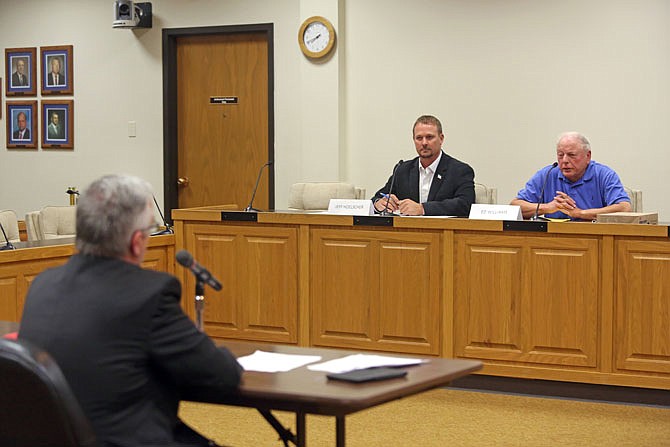 Jeff Hoelscher, left, and Ed Williams answer debate questions during a forum Tuesday at the Jefferson City Hall. Both are candidates for Cole County Eastern District commissioner.