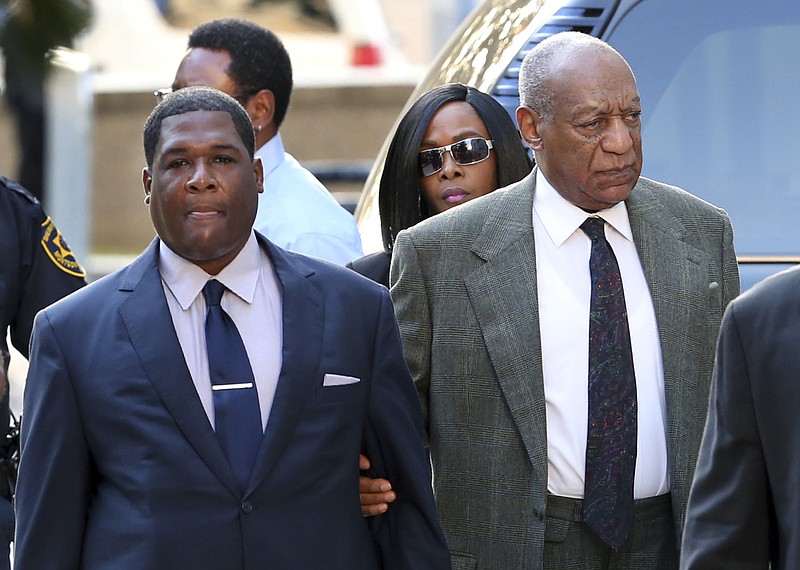 Bill Cosby, right, arrives for a hearing in his sexual assault case at the Montgomery County Courthouse on Wednesday, Nov. 2, 2016, in Norristown, Pa.  Cosby is returning to court to hear if a judge will allow his damaging decade-old testimony from an accuser's lawsuit to be used at his June criminal trial.