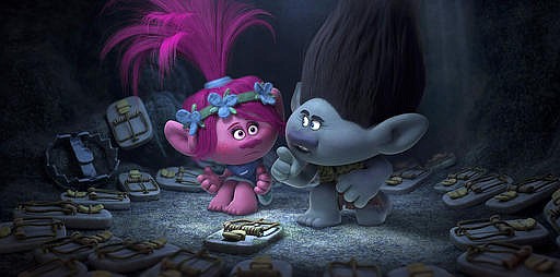 This image released by Dreamworks Animation shows characters Poppy, left, voiced by Anna Kendrick, and Branch, voiced by Justin Timberlake in a scene from "Trolls."