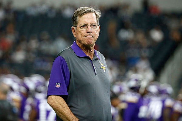 In this Aug. 29, 2015, file photo, Vikings offensive coordinator Norv Turner watches the team warm up before a preseason game against the Cowboys in Arlington, Texas. Turner resigned Wednesday.