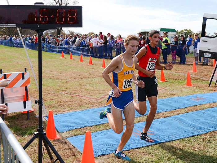 Alex Krieg of Fatima crosses the finish line Saturday in Missouri's Class 2 boys state cross country championships at Oak Hills Golf Center in Jefferson City.