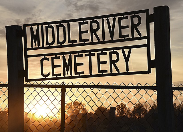The sun sets on another productive day at Middle River Cemetery where Michael Banak has been working for the last three years to locate graves and buried markers in an effort to remap the hilltop Tebbetts cemetery.