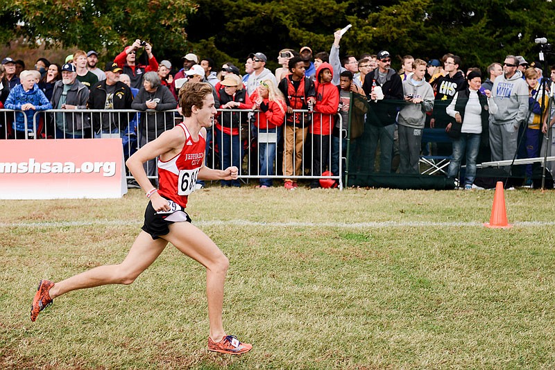 Jackson Schwartz of Jefferson City approaches the finish line Saturday, Nov. 5, 2016 in Missouri's Class 4 state cross country championships at Oak Hills Golf Center in Jefferson City. Schwartz finished 11th.