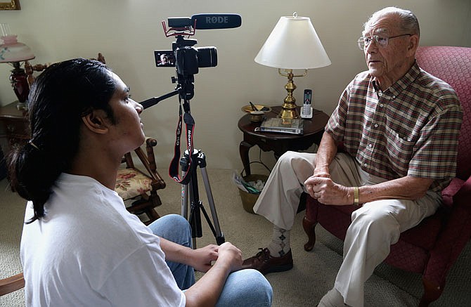 Rishi Sharma interviews World War II veteran William Hahn last month at his home in Los Angeles. Sharma's heroes aren't sports or movie stars, or any other kind of stars; they're the U.S. combat veterans who won World War II. Sharma has launched a campaign to try to ensure the legacy of each World War II combat veteran. 