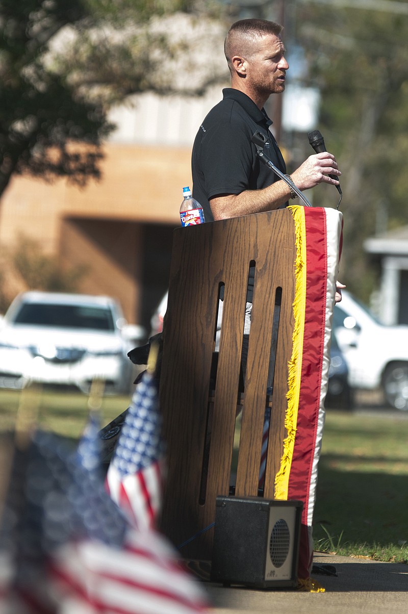 Marine Corps veteran Charles 'Dozer' Reed with the Wounded Warrior Project speaks Monday during the Veterans Day program at the courthouse in Ashdown, Ark.

