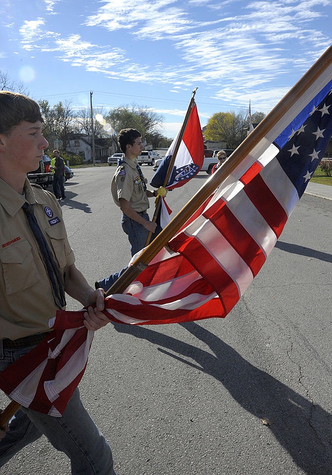 Boy Scouts from troops 96 and 104 presented the colors during the dedication program for the Blue Star Memorial Friday in Russellville.