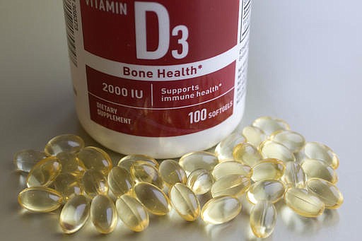 Vitamin D tablets are displayed, Wednesday, Nov. 9, 2016, in New York. Doctors are warning about vitamin D again, and it isn't the "we need more" news you might expect. Instead, they say there's an epidemic of needless testing and too many people taking too many pills for a deficiency that very few people truly have.