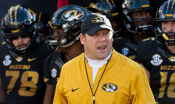 Missouri head coach Barry Odom walks on the field prior to the start of last Saturday's game against Vanderbilt at Faurot Field in Columbia.