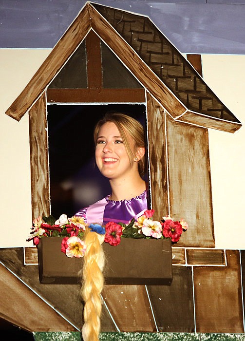 Caraline Brinkman ,16, rehearses Tuesday, Nov. 15, 2016 as Rapunzel in "Dessert with Disney" at Lighthouse Preparatory Academy in Jefferson City.