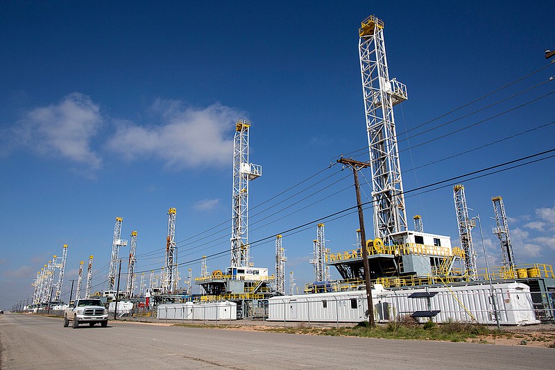 In this May 18, 2015, file photo, more than 30 oil drilling rigs stood idle in Odessa, Texas. Ken Medlock, director of an energy-studies program at Rice University in Houston, says an assessment Tuesday, Nov. 15, 2016 by the U.S. Geological Survey that the Wolfcamp Shale in the Midland-Odessa region could yield 20 billion barrels of oil is another sign that "the revival of the Permian Basin is going to last a couple of decades." 