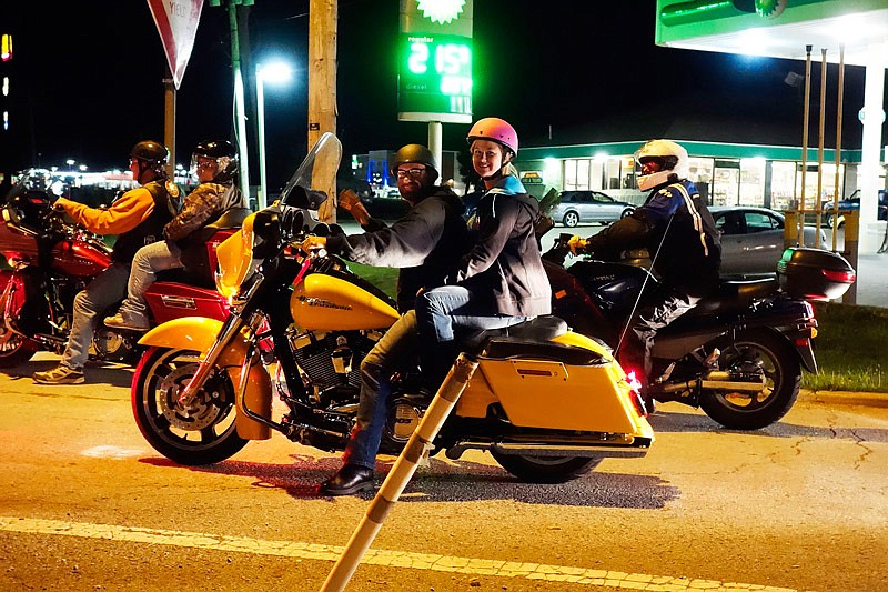 A pair on this motorcycle joined about 200 other bikers June 29, 2016 to escort the Honor Flight home to Columbia, Mo. Motorcycle enthusiasts routinely meet in Kingdom City as an escort for each Honor Flight.