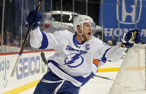 In this Tuesday, Nov. 1, 2016 file photo, Tampa Bay Lightning center Steven Stamkos reacts after scoring against the New York Islanders during the first period of an NHL hockey game in New York. Stamkos. New Jersey's Taylor Hall. Calgary's Johnny Gaudreau. Los Angeles' Jonathan Quick. The NHL's injured-reserve list could ice its own all-star lineup. If it seems the league is missing some of its top talent due to injuries a quarter into the season, you're not mistaken.