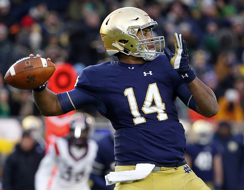 In this Nov. 19, 2016, file photo, Notre Dame quarterback DeShone Kizer looks to pass against Virginia Tech during the first half of an NCAA college football game in South Bend, Ind. Kizer says Notre Dame players are remembering the pain they felt two years when they were embarrassed in a 49-14 loss to Southern California as the struggling Fighting Irish prepare to face the 12th-ranked Trojans, who have won seven straight after a 1-3 start.