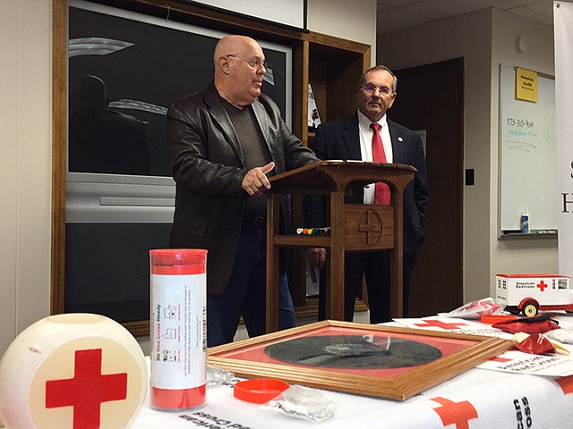 Mark Schreiber, left, and Dave Griffith speak at a news conference for the upcoming 100th centennial celebration of the American Red Cross of Central and Northern Missouri. Schreiber is the co-chairman of the centennial committee, and Griffith is executive director of the regional organization.