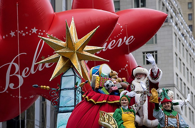 Santa Claus waves to spectators Thursday along Central Park West during the Macy's Thanksgiving Day Parade in New York.