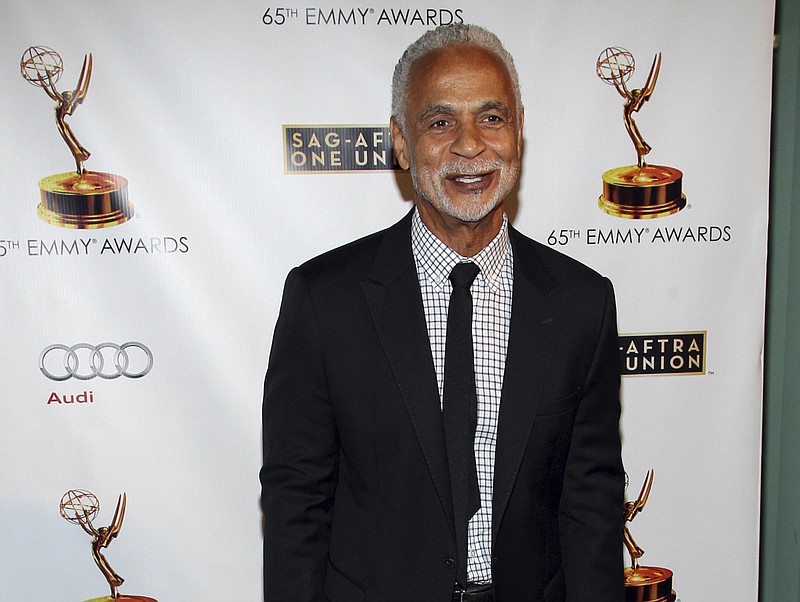 In this Sept. 17, 2013 file photo, actor Ron Glass arrives at the 65th Emmy Awards Nomination Celebration at the Academy of Television Arts and Sciences in Los Angeles. Glass, the handsome, prolific character actor best known for his role as Ron Harris, the gregarious, sometimes sardonic detective in the long-running cop comedy "Barney Miller," has died at age 71. Glass died Friday, Nov. 25, 2016, of respiratory failure, his agent, Jeffrey Leavett, told The Associated Press on Saturday.