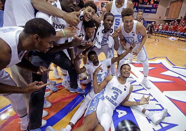 North Carolina players celebrate after defeating Wisconsin 71-56 last week at the Maui Invitational in Lahaina, Hawaii. 