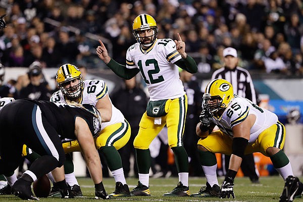 Packers quarterback Aaron Rodgers makes a signal during Monday night's game against the Eagles in Philadelphia.