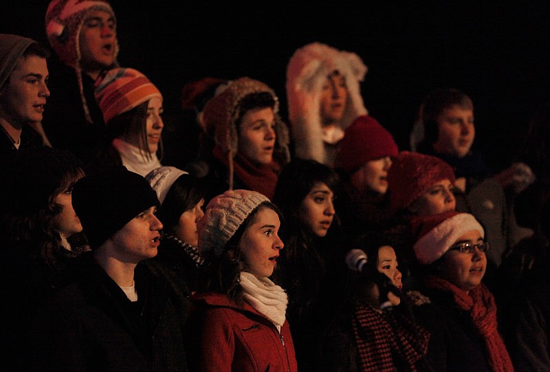 In this Nov. 11, 2014 file photo, members of the Helias High School Choir sing Christmas carols for a crowd gathered for the annual lighting of the Jefferson City Mayor's Christmas Tree at Rotary Park.