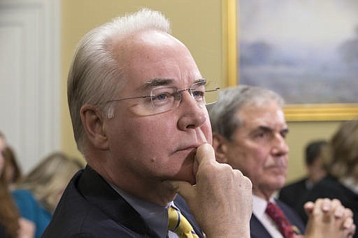  In this Jan. 5, 2016, file photo, Rep. Tom Price, R-Ga., chairman of the House Budget Committee appears before the Rules Committee, joined at right by Rep. John Yarmuth, D-Ky., on Capitol Hill in Washington. Republicans hope that as President-elect Donald Trump's choice to run the Department of Health and Human Services, Price will preside over the dismantlement of President Barack Obama's signature health care law. 