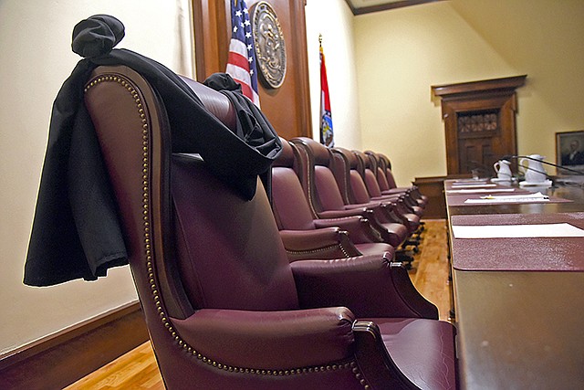 Black cloth is draped over Missouri Supreme Court Judge Richard B. Teitelman's chair Wednesday at the Missouri Supreme Court. Teitelman died Tuesday.