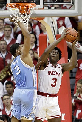 Indiana's OG Anunoby heads to the basket as North Carolina's Kennedy Meeks defends during Wednesday night's game in Bloomfington, Ind.