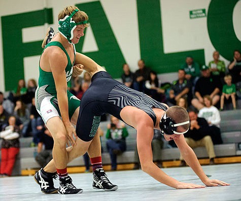 Blair Oaks' Dalton Bridges drags his opponent back to the center of the mat in a 120-pound match last season in Wardsville.