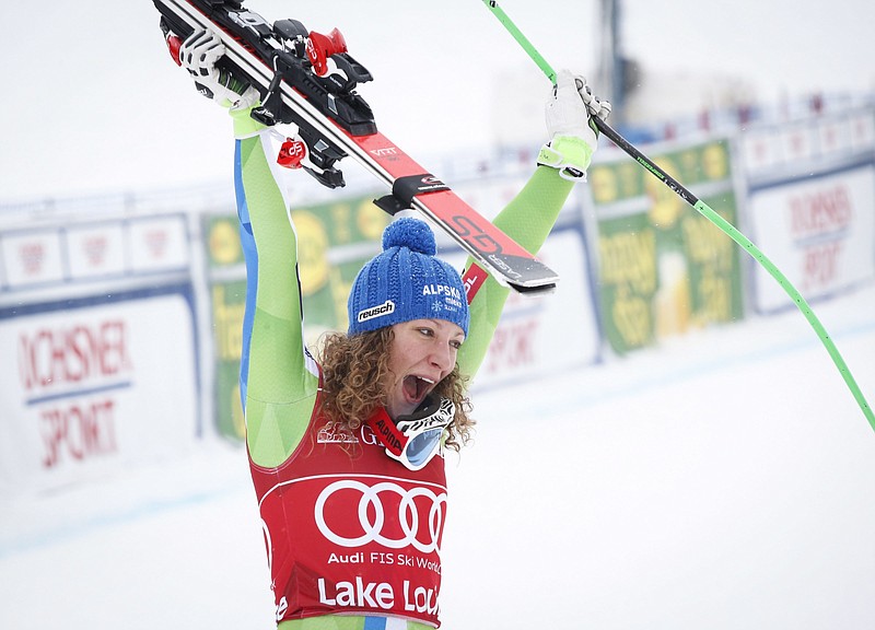 Slovenia's Ilka Stuhec celebrates following her win in the women's World Cup downhill ski race at Lake Louise, Alberta, Friday, Dec. 2, 2016. 
