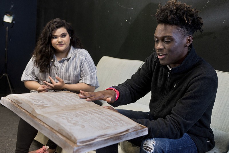 In this Thursday, Nov. 17, 2016 photo, Pine Tree senior Kenny Jackson speaks in Longview, Texas, about designing a grave marker to commemorate the life of his friend Josh Warren who passed away last year.