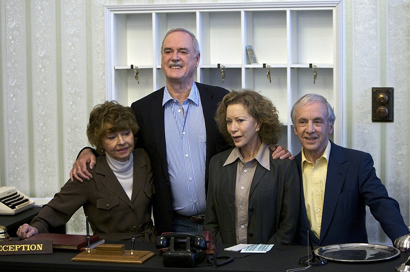  In this Wednesday, May 6, 2009 file photo, the cast of TV comedy series Fawlty Towers, from left, Prunella Scales, John Cleese, Connie Booth and Andrew Sachs reunite to celebrate the 30th anniversary of the TV show and mark a special programe "Fawlty Towers: Re-opened" at The Naval and Military Club, London. Comic actor Andrew Sachs, known primarily for his role as Manuel in the 1970s situation comedy Fawlty Towers, has died it was announced Thursday, Dec. 1, 2016. He was 86 and had been suffering from vascular dementia. 