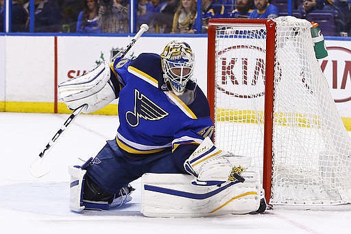 St. Louis Blues goalie Carter Hutton makes a save during the first period of an NHL hockey game against the Winnipeg Jets, Saturday, Dec. 3, 2016, in St. Louis.