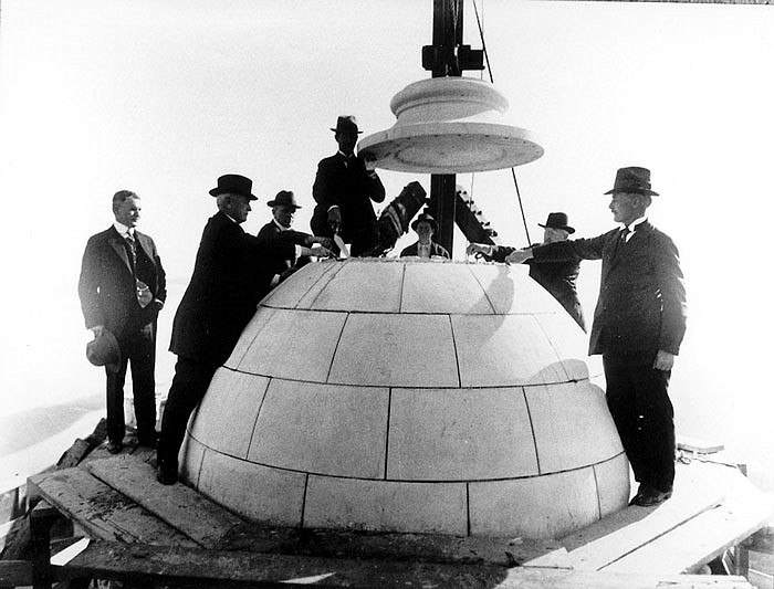 Members of the Missouri State Capitol Commission board assist in laying the Capitol capstone on Dec. 5, 1916.