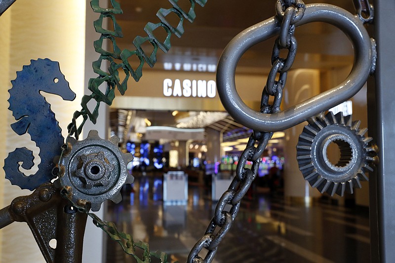 A portion of Bob Dylan's "Portal," a metal collage with an aquatic theme, is seen during a preview tour of the MGM National Harbor on Friday in Oxon Hill, Md. 