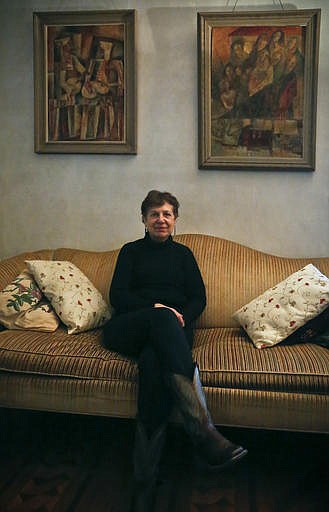 In this Monday, Nov. 28, 2016 photo, Dinah Bazer poses at her home in New York. Bazer found relief from cancer anxiety by being treating with a dose of psilocybin administered by a New York University study. Two studies, published Thursday, Dec. 1, 2016, say a single dose of the psychedelic ingredient in "magic mushrooms" can quickly and effectively treat anxiety and depression in cancer patients, an effect that may last for months.