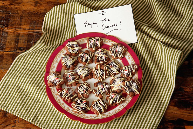 These chocolate cookies are topped with two kinds of melted chocolate and crushed peppermint candies.