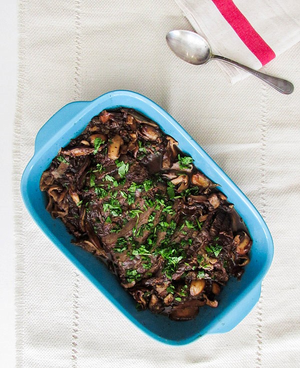 Brisket with wild mushrooms. Brisket is a tough and fairly inexpensive cut of meat that gets amazingly tender after some quality time in the oven, and it requires little attention or care while it cooks.