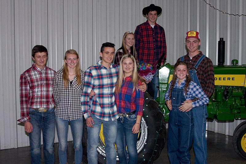 The 2016 California FFA Barnwarming Royalty are, on the tractor, freshmen Queen Hailey Cain and King Alex Currens; and standing, from left, juniors Allee Koestner and Cole Schlup; sophomores, Mackenzie Swillum and John Calton; and seniors Ellie Wirts and Jackson Trachsel.