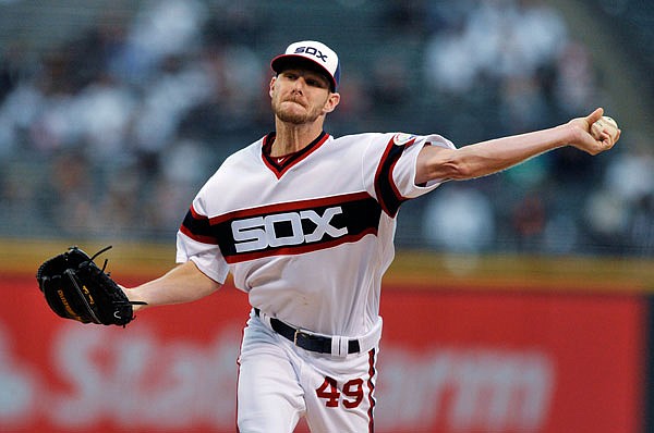 In this Oct. 2 file photo, White Sox pitcher Chris Sale delivers to the plate during a game against the Twins in Chicago. The Red Sox traded for Sale on Tuesday.