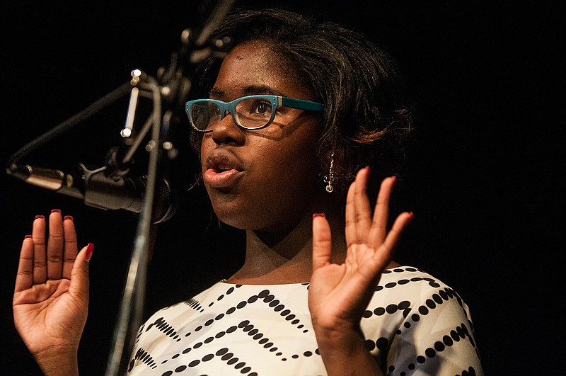 North Heights Entrepreneurial Leadership Academy seventh-grade student Mariah Huntley performs the poem "Still, I Rise" by Maya Angelou during the Express Yourself Poetry Night Wednesday at the Silvermoon on Broad Theatre. The event was the culmination of the English department's poetry project-based learning unit, wherein all students wrote and performed poetry at school. The winners from each class were given the opportunity to showcase their talents Wednesday night on stage at the Silvermoon on Broad for peers and parents.