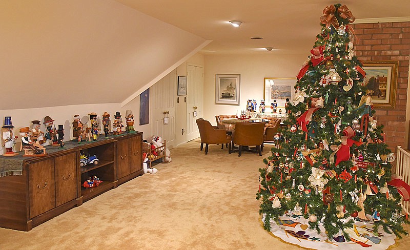 Joann Firley has an upstairs room decorated for the Heisinger Homes Tour. Firley, the oldest of her siblings, was always in charge of decorating the tree as a child and has since been very festive for holidays.