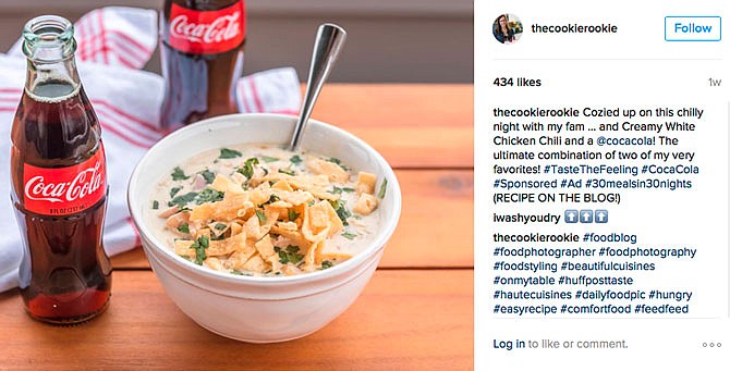 This image shows a social media post featuring a bottle of Coca-Cola next to a bowl of chicken chili. Coca-Cola is trying to sell more of its flagship beverage by suggesting the cola can accompany a wide range of meals, rather than just the fast food and pizza with which it's a mainstay.