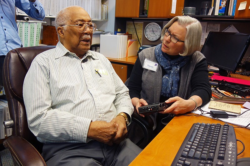 Virgil "Jack" McBride, who served in the U.S. Navy during World War II, recounts his memories to Kingdom of Callaway Historical Society board member Susan Krumm. 