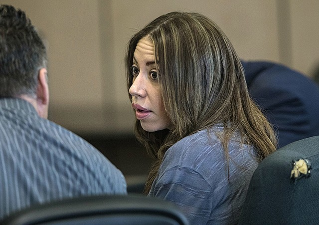 Dalia Dippolito talks with defense attorney Brian Claypool on the second day of testimony in her murder-for-hire retrial Thursday in West Palm Beach, Florida.