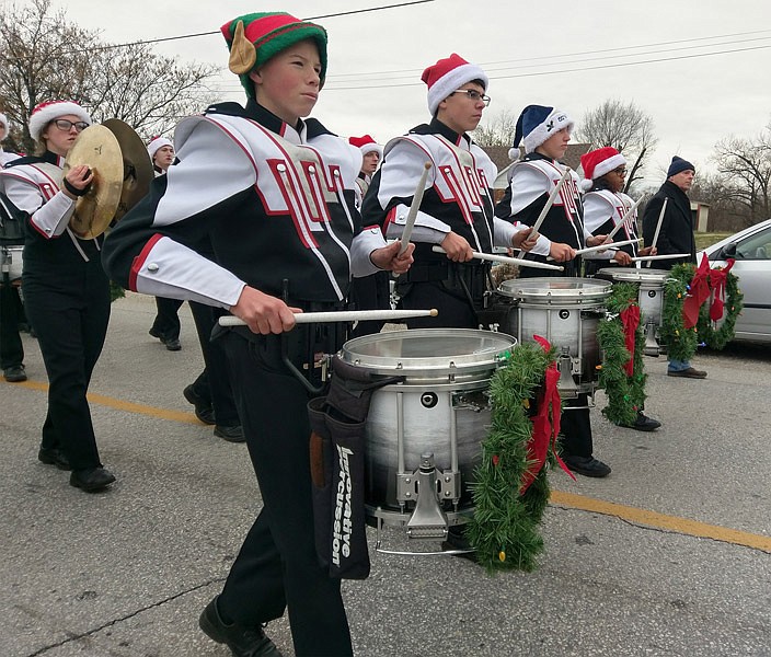 Jefferson City High School's marching band was festively adorned for the Holts Summit Christmas Parade on Saturday, Dec. 10, 2016.